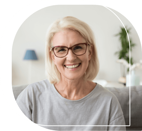 Senior woman with glasses smiling