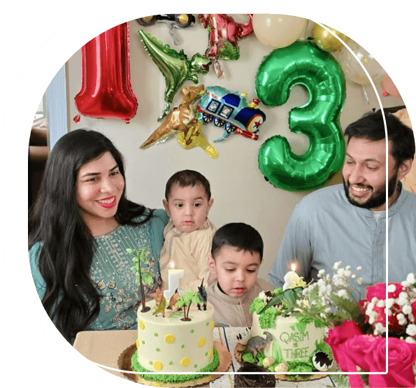 Doctor Waqar with her husband and two small children at a birthday party