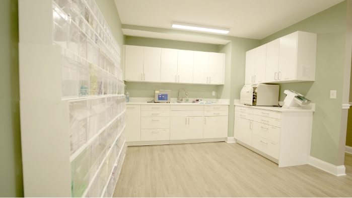 White cabinets in sanitation and storage room